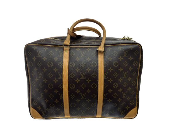 Sac de voyage Louis Vuitton Vintage. Etat neuf.